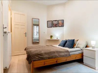 Bedroom with double bed at Doma Budapest