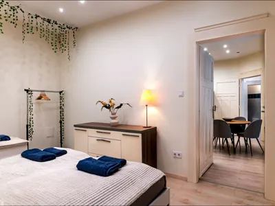 Wide view of the three-bed bedroom at Doma Budapest