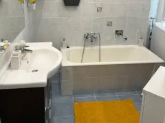 Bathroom with bathtub at Doma Budapest